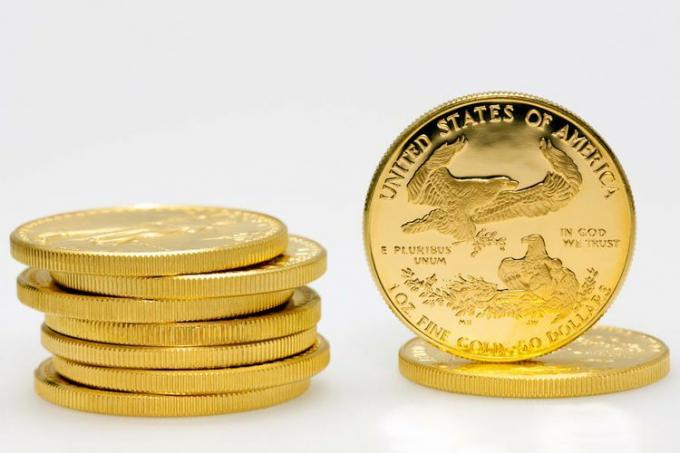 Stak af amerikanske gulddollarmønter 